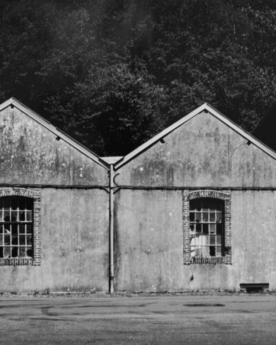 Black and white analogue photography by Jeroen Busschers capturing old industrial buildings wit grafitti