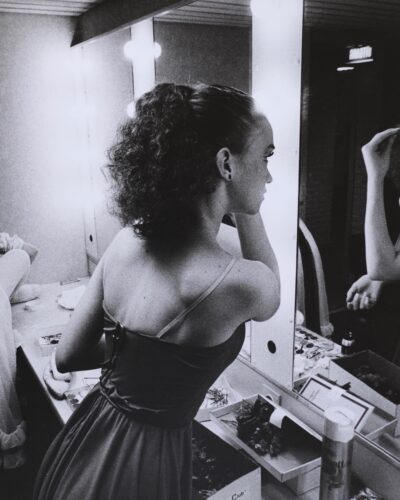 Analogue film photography of classical ballet dancers backstage in the dressing room mirror, documentary black and white photography, by Jeroen Busschers