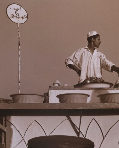 Analogue film Photography of an escargot street food vendor at Jemaa el-Fnaa square in Marrakesh, Morocco, by Jeroen Busschers